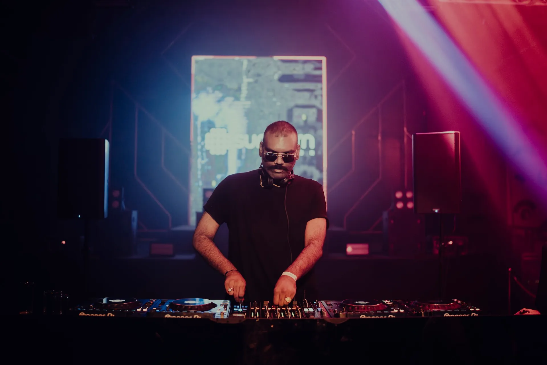 Raka Ashok performing in the DJ booth