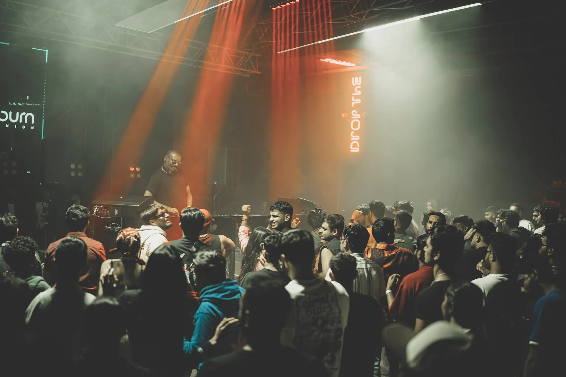 Crowd and stage lighting at a Raka Ashok show